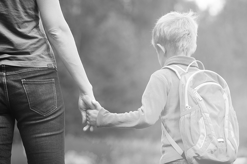 Child holding hand